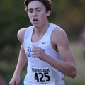 Austin Fox of Springdale Har-Ber keeps a steady pace to his run during the 7A-West Conference cross ...