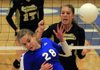 Conway’s Sara Stovall gets hit by the ball in front of Bentonville’s Rebecca Brown (left) and Kelsey Parks during the Class 7A state championship semifinals Thursday in Conway. Bentonville will face Fayetteville in the finals on Saturday. 