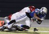 STAFF PHOTO ANTHONY REYES -- Rogers junior Stokes Wenzler (18) runs for a big gain while Fort Smith Northside junior Gabe Sopeshire makes the tackle Friday Oct. 28, 2011 at Mounties Stadium in Rogers. Visit http://photos.nwaonline.com/ to see more photos from this game.