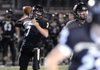 STAFF PHOTO J.S. WEDGEWORTH -- Bentonville's Dallas Hardison throws to a reciever Friday, Oct. 28, 2011, to score a touchdown against Springdale High at Tiger Stadium in Bentonville. 