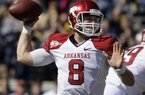 Arkansas quarterback Tyler Wilson (8) passes against Vanderbilt in the second quarter of an NCAA college football game on Saturday, Oct. 29, 2011, in Nashville, Tenn.