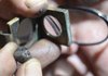 Linus Faber looks at a raw, uncut diamond on Oct. 19, at Linden’s Jewelry and Repair in Bella Vista.
