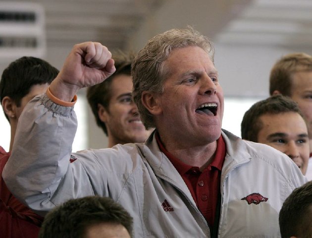arkansas-democrat-gazettedavid-gottschalk-arkansas-head-track-coach-chris-bucknam-celebrates-with-his-team-sunday-afternoon-at-the-sec-indoor-championships-at-the-randal-tyson-track-center-in-fayetteville-22810