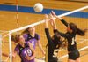 Taylor Riney (2) and Melanie Pickering (8) celebrate with teammates Saturday after winning the 7A State Volleyball Championship against Fayetteville at Buzz Bolding Arena at Conway High School.