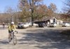 Tom and Karen Mowry ride away from the busy Catalpa general store and cafe after lunch. The pavement ends at tiny Catalpa, a town steeped in Ozark character.