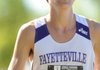 Fayetteville senior Aidan Swain nears the finish line of the 23rd annual Chile Pepper Cross Country Festival last month. Swain will compete in the Class 7A State Cross Country Meet on Saturday in Harrison. The 7A boys race starts at 9 a.m. at NorthArk Community College.