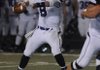 STAFF PHOTO J.S. WEDGEWORTH -- Fayetteville's Austin Allen looks for a reciever Friday, Nov. 4, 2011, while taking on Heritage High in Rogers.