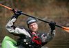 Ben Hodgin of Rogers demonstrates rolling techniques in a small kayak at a previous Lincoln Lake Outdoor Festival. This year’s event is Nov. 5.
