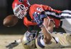 STAFF PHOTO ANDY SHUPE
Farmington defender Jacob Naylor (36) strips the ball from Shiloh Christian junior receiver Ryan Michaelis Friday, Nov. 4, 2011, during the first half of play at Allen Holland Field in Farmington. Go to photos.nwaonline.com to see more photos.