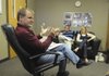 HEALING PROCESS Pastor Rodney Holmstrom talks about the Celebrate Recovery program, which has helped Heath and Denise England, seated.
