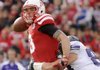 Northwestern’s Quntin Williams (right) tackles Nebraska quarterback Taylor Martinez (3) during the first half of the Wildcats’ 28-25 victory over the No. 10 Cornhuskers on Saturday in Lincoln, Neb. 