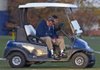 Penn State football coach Joe Paterno sits in a cart at the beginning of practice at the fields behind the Lasch Football Building on Wednesday, Nov. 9, 2011, in State College, Pa. Paterno said earlier Wednesday he will retire at the end of this season. At right is Tommy Venturino, director of football operations. (AP Photo/The Patriot-News, Joe Hermitt)