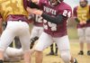 Dustin Simmons, Lincoln senior fullback, blocks Tuesday during practice at Lincoln High School.