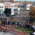 A crowd gathers Friday, Nov. 11, 2011, in downtown Bentonville for the Crystal Bridges Museum of Ame...