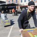 MEN IN MOTION Ryan Brazell, right, and John Brecht, both of Fayetteville, move boxes Thursday while ...
