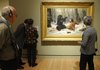 Museumgoers look at Arthur Fitzwilliam Tait’s “The Life of a Hunter: A Tight Fix” on Nov. 11 during opening day at the Crystal Bridges Museum of American Art in Bentonville.