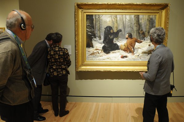 
                               
                                  Photo by Justin Wedgworth&mdash;
                               
                           
                           Museumgoers look at Arthur Fitzwilliam Tait’s “The Life of a Hunter: A Tight Fix” on Nov. 11 during opening day at the Crystal Bridges Museum of American Art in Bentonville.