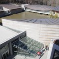 Visitors make their way Friday, Nov. 11, 2011, to the Crystal Bridges Museum of American Art in Bent...