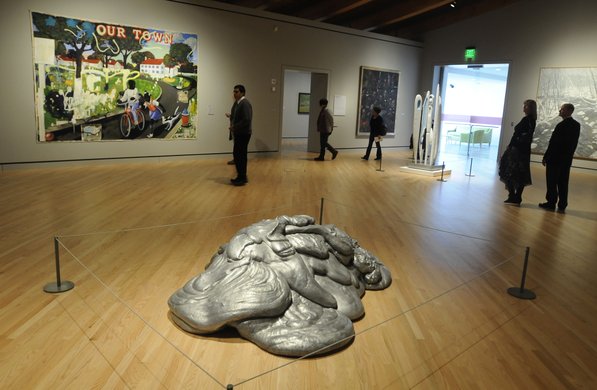 
                               
                                  Photo by Justin Wedgworth&mdash;
                               
                           
                           Visitors look at art displays Friday, Nov. 11, 2011, during the opening day at the Crystal Bridges Museum of American Art in Bentonville. The sculpture in the front is Lynda Benglis' "Eat Meat."