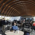 Visitors eat lunch Friday, Nov. 11, 2011, at Eleven during the opening day at the Crystal Bridges Mu...