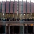 Visitors gather in the restaurant, "Eleven, " during the grand opening of Crystal Bridges Museum of ...