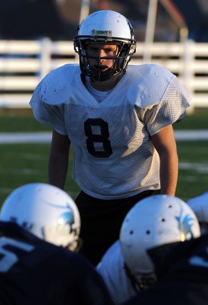 Springdale Har-Ber linebacker Seth Banks works out during practice Wednesday at the school’s practice field in Springdale.
