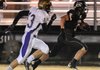 STAFF PHOTO SAMANTHA BAKER - West Fork High School's Wil Jarnagan, right, is too quick for Mayflower High School's Bradley Chamblis Friday, Nov. 11, 2011 at Tiger Stadium in West Fork. 