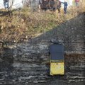 WRANGLER FISHING Crews from McKnight’s Emergency Wrecker Service in West Fork lift a Jeep Wrangler o...
