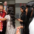 WELCOME Willa Naisher, far right, and Yolani Jerry, second from right, watch as Darrellyn Ralph, cen...