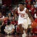 Arkansas Democrat-Gazette/RYAN MCGEENEY - 11-11-11 - Razorbacks guard Julysses Nobles sprints upcour...