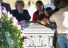  11/11/11
Arkansas Democrat-Gazette/STEPHEN B. THORNTON
The brother of fallen Oklahoma Army National Guard soldier Spc. Sarina Butcher leans over to kiss her casket following burial services for the 19-year-old at in Friendship Cemetery near McCaskill Friday afternoon. 

Oklahoma Army National Guard soldier Spc. Sarina Butcher. Oklahoma Army National Guard soldier who was killed in Afghanistan will be buried in Arkansas.

National Guard officials say services for 19-year-old Oklahoma Army National Guard soldier Spc. Sarina Butcher will be held at 2 p.m. Friday at Brazzel-Cornish Funeral Home in Prescott. Burial will follow in Friendship Cemetery near McCaskill.11/11/11
Arkansas Democrat-Gazette/STEPHEN B. THORNTON
The brother of fallen Oklahoma Army National Guard soldier Spc. Sarina Butcher leans over to kiss her casket following burial services for the 19-year-old at in Friendship Cemetery near McCaskill Friday afternoon. 

Oklahoma Army National Guard soldier Spc. Sarina Butcher. Oklahoma Army National Guard soldier who was killed in Afghanistan will be buried in Arkansas.

National Guard officials say services for 19-year-old Oklahoma Army National Guard soldier Spc. Sarina Butcher will be held at 2 p.m. Friday at Brazzel-Cornish Funeral Home in Prescott. Burial will follow in Friendship Cemetery near McCaskill.