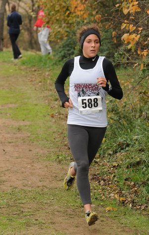 Maggie Montoya, Rogers High School runner, approaches the twomile mark in the girls 5K race in the High School Cross Country All-Star Invitational at Rogers High on Saturday. Montoya finished second with a time of 18:08.51.
