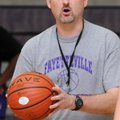 Vic Rimmer, Fayetteville High School’s girl’s basketball coach, tells players the corrections they n...