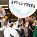 Jacob Warmack, 6, left, and Elaina Fuhrman, 6, penguins representing the continent of Antarctica, li...