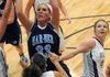 Caroline Eubanks, Springdale Har-Ber, goes up for the shot on Tuesday at Siloam Springs High School. The Lady Wildcats won the matchup against the Panthers of Siloam Springs, 49-47.