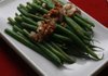 Onions and pecans sauteed in butter can dress up your greens if you're on a tight budget.