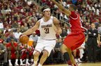 Arkansas' Michael Sanchez (31) drives against Houston's TaShawn Thomas, right, during the first half of an NCAA college basketball game, Friday, Nov. 18, 2011, in North Little Rock, Ark. (AP Photo/Brian Chilson)