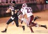 Dylan Harrison, West Fork senior quarterback, carries the ball as he is pursued by Barton senior linebacker Samuel Roberts and junior linebacker Kedrick Jackso on Friday during the first half of play at West Fork High. Go to photos.nwaonline.com to see more photos.
