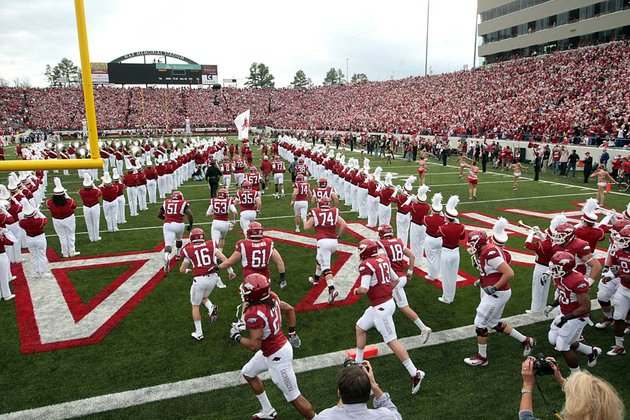 111911-arkansas-democrat-gazettestephen-b-thornton-arkansass-razorbacks-runs-out-onto-the-field-at-the-start-of-their-game-saturday-against-mississippi-state-at-war-memorial-stadium