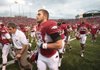 Arkansas Razorbacks tight end Garrett Uekman (No. 88) runs off the field at halftime of their  game Saturday against Mississippi State at War Memorial Stadium.