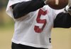 Spencer Boudrey, a Farmington running back, catches a ball Tuesday during practice at Farmington High. Boudrey began the season as a wide receiver but took over rushing duties when teammate Jared Martin was injured.