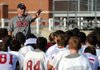 Springdale High football coach Shane Patrick talks to his players after a preseason practice in August at Jarrell Williams Bulldog Stadium. The Red’Dogs finished their season 3-8 and advanced to the state playoffs for the fourth straight year.