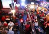 Arkansas Democrat-Gazette/WILLIAM MOORE
Patrons and fans watch the University of Arkansas play LSU in football Friday, November 25, 2011 at Grubs Bar and Grille in Fayetteville.