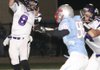Fayetteville quarterback Austin Allen looks for a receiver Friday night against Fort Smith Southside at Jim Rowland Stadium.