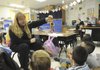 Krista Roth, a teacher at Bonnie Grimes Elementary, shows Native American art from her time as a teacher on an Indian reservation in Arizona.
