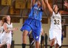 Rogers junior forward Taylor Strickland (24) reaches to score past West Fork senior forward Melissa Jones (32) Tuesday during the second half of play in the Tiger Dome in West Fork.