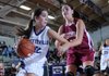 Fayetteville High School’s Hailey Young, left, drives around Jessica Brown of Collierville High School Dec. 1 during round one of the Lady Bulldog Classic at Fayetteville High School.
