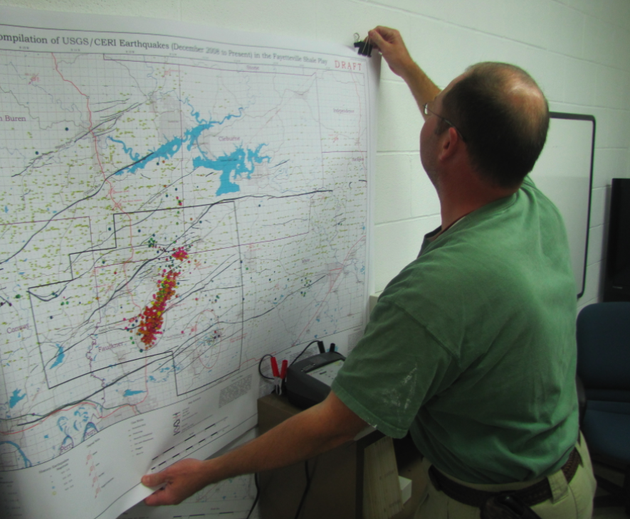 arkansas-geological-survey-geohazards-supervisor-scott-ausbrooks-puts-up-a-map-showing-the-location-of-earthquakes-in-central-arkansas-in-recent-months-during-a-recent-interview-at-his-little-rock-office
