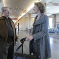 Gary Cuthbertson, left, and Mary Dunham, both with Merck Consumer Care, talk Wednesday while waiting...