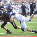 Mason Snow, left, Bentonville senior receiver, is brought down by Fayetteville junior safety Alex Br...